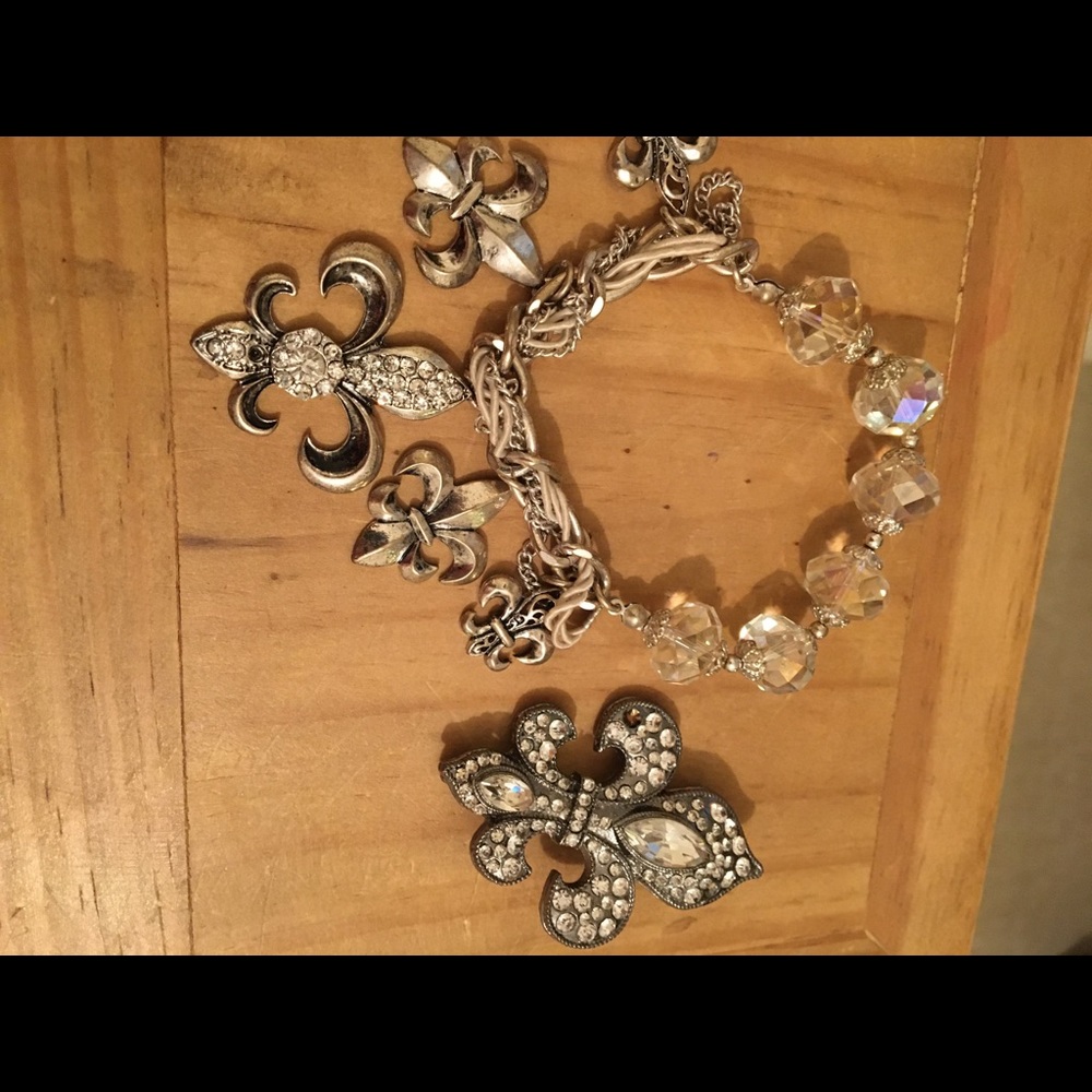 Fleur De Lis bracelet and brooch.